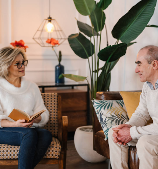 Image of a therapist, in a counseling setting, emphasizing professionalism and care in mental health.